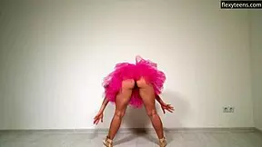 hot curly haired gymnast stretches flexible legs naked on sofa doing acrobatic pussy play