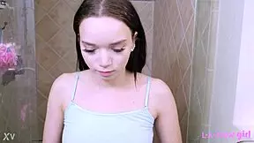 fierce petite brunette milf mommy strips in shower after photoshoot