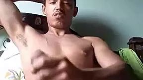 Young Tanned Colombian Hunk Jerks Cock to Cum