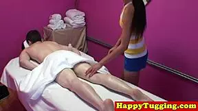 asian masseuse sneaks a tug on hidden cam