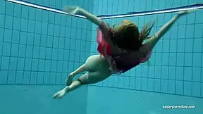 big tits silvie swims bikini-off, flashes hairy pussy underwater?