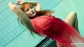 big tits silvie swims bikini-off, flashes hairy pussy underwater?