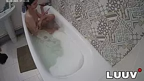 luuv elika shaves legs smooth in bathroom for voyeur camera