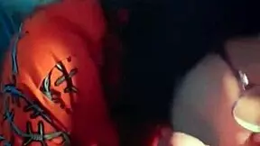 This latina slut with glasses and long hair gives excellent homemade blowjobs to her friend while showing natural tits