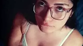 This latina slut with glasses and long hair gives excellent homemade blowjobs to her friend while showing natural tits