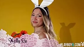 curvy asian teen kelly lu slowly strips her big tits and ass sensually for playboy