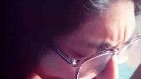 This latina slut with glasses and long hair gives excellent homemade blowjobs to her friend while showing natural tits