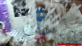 lesbian students haze newbie with pussy licking in steamy shower group session