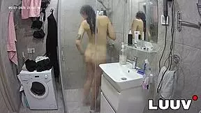 hey check out tattooed alice flashing her shaved pussy in the shower