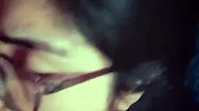 This latina slut with glasses and long hair gives excellent homemade blowjobs to her friend while showing natural tits