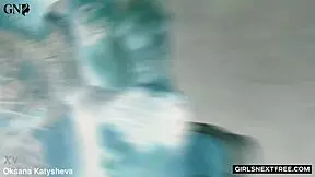 Polly Yang kneels in gloryhole sucking two huge cocks before deepthroat face fucking and cumshot.