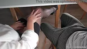 sexy secretary in stockings sneaks under desk to jerk boss's cock with nylons till massive cum explosion