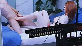 She strokes her girlfriend's feet, building up to a wild foot fetish climax.