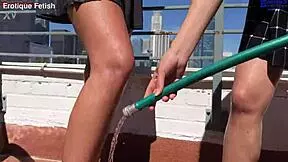 Erotique two amateur girls suck Eric John's monster cock for outdoor barefoot footjobs on balcony patio