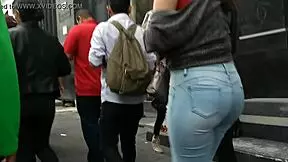 voyeur spies latina teen ass shaking in tight jeans