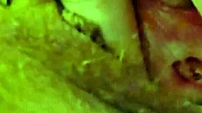 woman moans softly while rubbing clit with vibrator and fingers gently