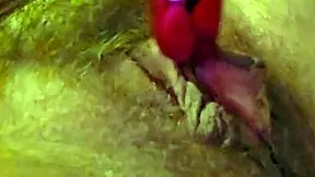 woman moans softly while rubbing clit with vibrator and fingers gently