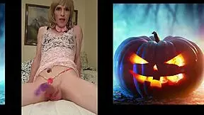 Shemale in sexy Halloween costume strokes monster cock to massive cumshot