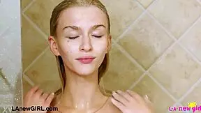 Curious Blonde Teen Enjoys Steamy Shower Moment