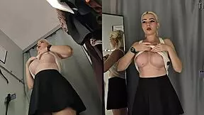 spy cam catches blonde's big tits and bare pussy in fitting room change