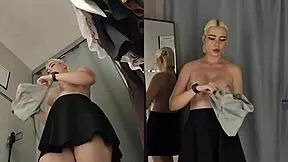 spy cam catches blonde's big tits and bare pussy in fitting room change