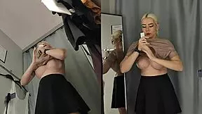 spy cam catches blonde's big tits and bare pussy in fitting room change