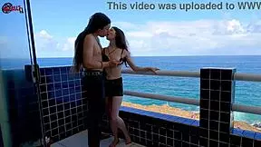 Having so much fun on the terrace balcony rooftop in front of ocean kissing flashing big natural tits pretty brunette babe