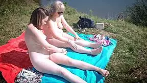 mature mommy and young beach girl go naked public sunbathing big ass natural tits old young taboo bisex couple outdoor legs
