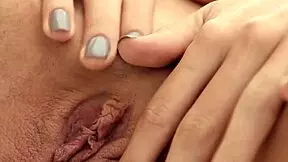 After bikini drops her fingers tease shaved pussy outdoors?