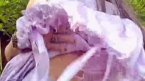 petite tease strips outdoors in sundress session two