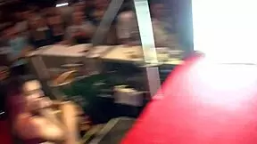 two crazy asses going wild on stage outdoors.