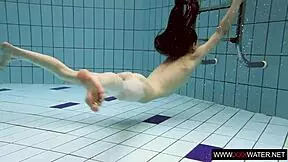 who's this long-haired brunette cutie bathing underwater in public?