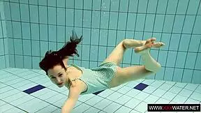 who's this long-haired brunette cutie bathing underwater in public?