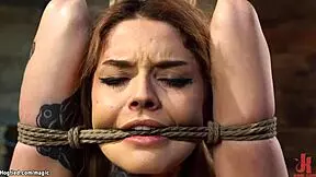 bound tattooed slut chokes on toys while hogtied and gagged