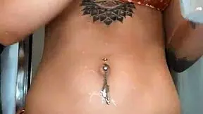 Oiled MILF Babe Skylarbonez's Big Tits Shimmer on Louis Vuitton Bikini Piercings