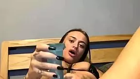 this slutty goth teen just loves pounding her little tight ass until she squirts cum everywhere