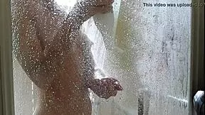 wanna watch sexy redhead milf rub pussy with coffee in shower?