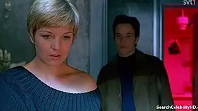 Sheryl Lee from Backbeat 1993 bares small tits in retro blue film handjob sex scene