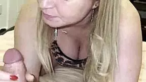 she lures her stepson with a teasing blowjob then begs him to fuck her hard on the bed.