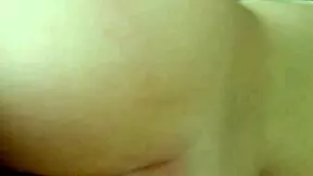 the oiled beauty bends over sofa taking deep doggystyle thrusts to horny orgasm