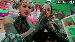 god these inked goth babes fist each other in latex skirts squirting everywhere