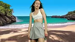 that cheeky teen dances panty-free on beach flashing her tight pussy lips