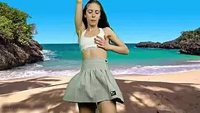 that cheeky teen dances panty-free on beach flashing her tight pussy lips