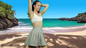 that cheeky teen dances panty-free on beach flashing her tight pussy lips