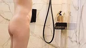 black hair japanese college girl bathes in shower showing legs