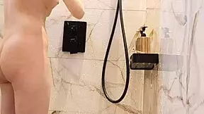 black hair japanese college girl bathes in shower showing legs