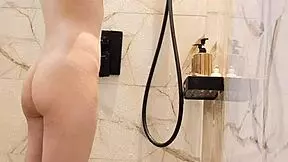 black hair japanese college girl bathes in shower showing legs