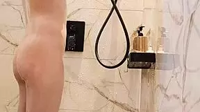 black hair japanese college girl bathes in shower showing legs