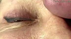 mature lady takes huge facial jizz load right on her eyes closeup