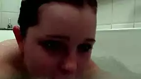shy angela rubs shaved pussy solo in steamy bath